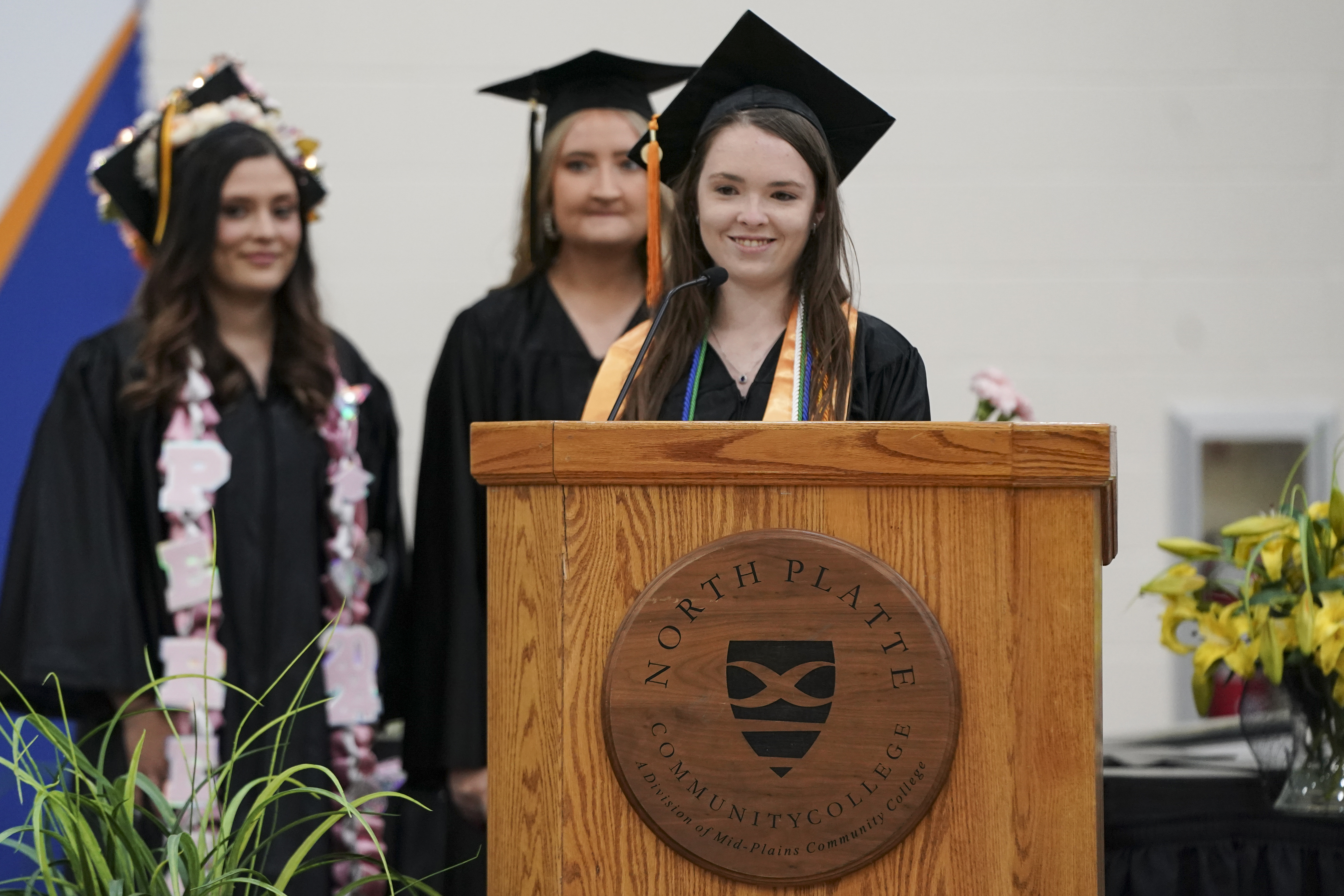 Isabella Arizona addresses classmates, friends and family during the Associate Degree Nursing pinning and commencement ceremony at the McDonald-Belton Gymnasium on Friday.