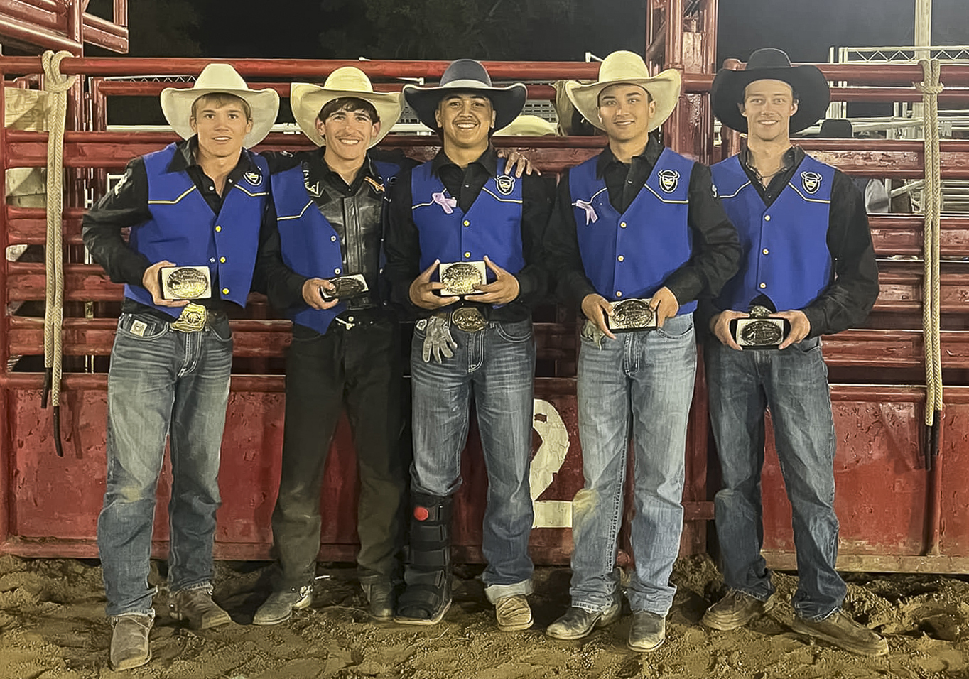 MPCC men's rodeo team pose for a photo with the hardware won at the Falcon Frontier Days Rodeo.