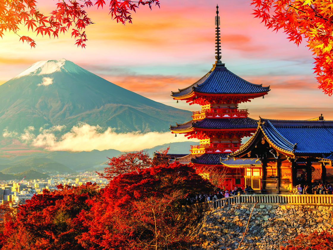 Kiyomizu-dera temple in Kyoto and mount Fuji at autumn sunset in Japan 